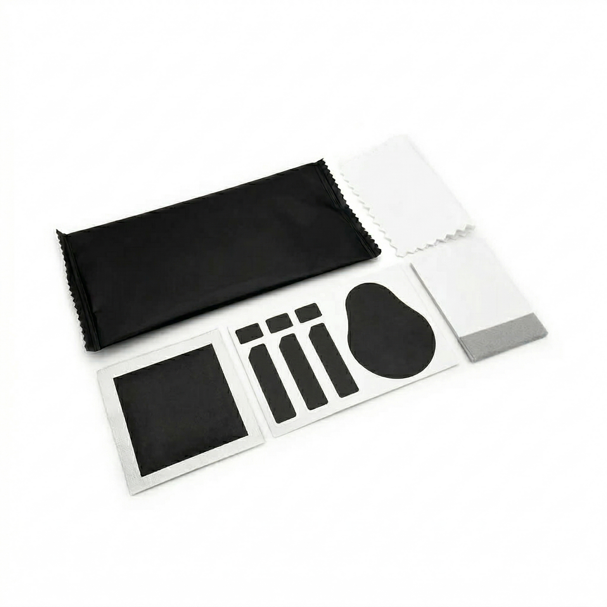 Everything you need: Cloth, wipes, guides, dust remover and squeegee. 